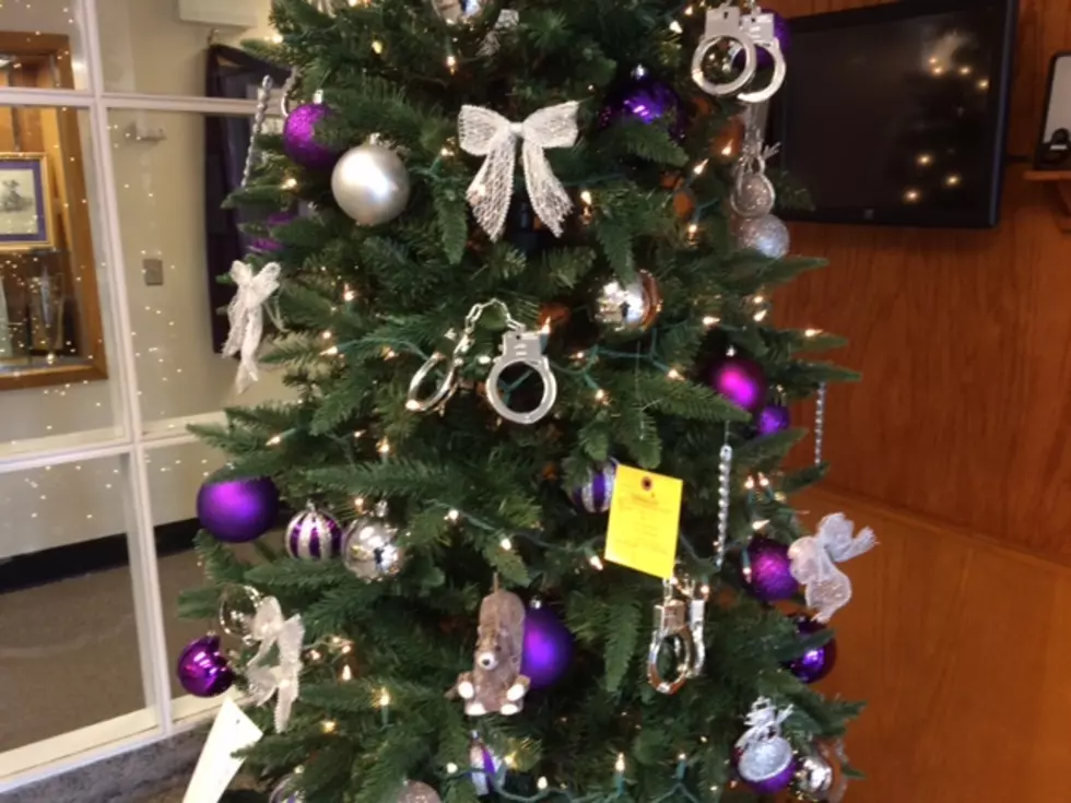 Oh, and check out the Troopers Christmas tree decorated with traffic summons', handcuffs and more Trooper items. Clever!